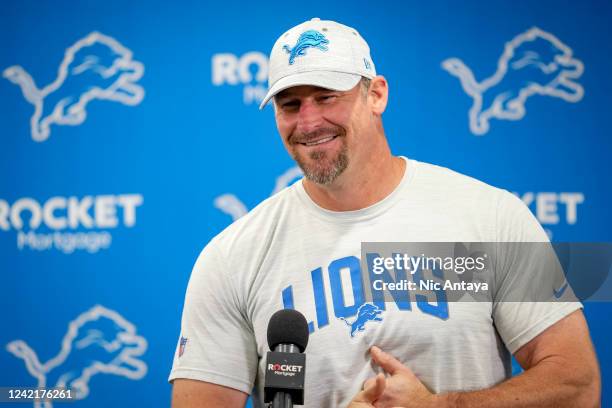 Head coach Dan Campbell of the Detroit Lions smile while answering questions from reporters during the Detroit Lions Training Camp at the Lions...