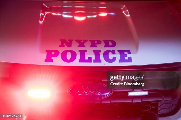 New York Police Department vehicle arrives at the scene of a shooting in the Crown Heights neighborhood in the Brooklyn borough of New York, U.S., on...
