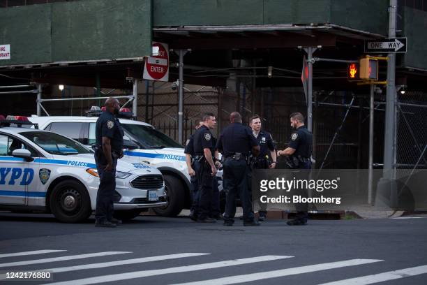 New York Police Department officers patrol the area near the Atlantic Terminal Mall in the Brooklyn borough of New York, U.S., on Thursday, July 21,...