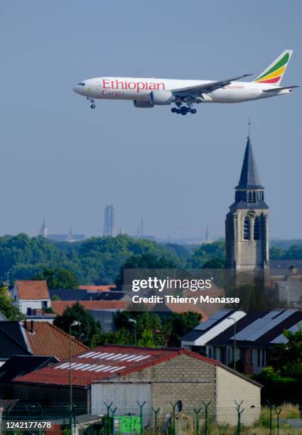 Boeing 777-F60 from Ethiopian Cargo is landing in Brussels Airport on July 29, 2022 in Zaventem, Belgium. Ethiopian Airlines is the national airline...