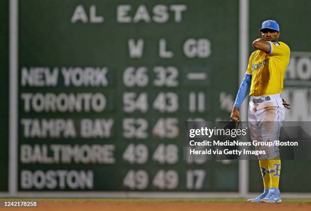 The Boston Red Sox are in last place in the AL East, as Xander Bogaerts of the Boston Red Sox waits for the next batter during the fifth inning of...