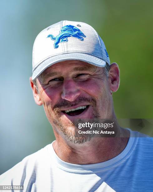 Head coach Dan Campbell of the Detroit Lions laughs after the Detroit Lions Training Camp at the Lions Headquarters and Training Facility on July 29,...