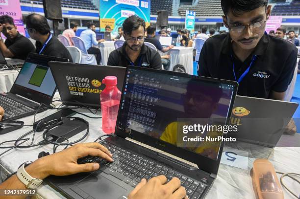 Hackers write codes during an offline hacking competition named Hackathon 2022, in Kolkata on July 29, 2022. The event, the first of its kind in the...