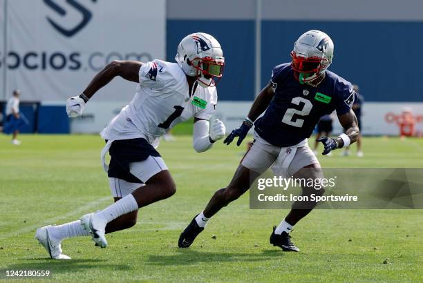 New England Patriots cornerback Jalen Mills covers New England Patriots wide receiver DeVante Parker during New England Patriots training camp on...