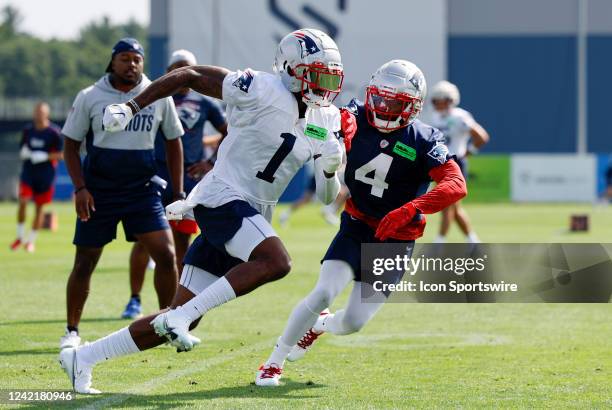 New England Patriots wide receiver DeVante Parker gets past New England Patriots cornerback Malcom Butler during New England Patriots training camp...