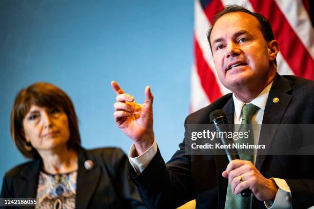 Rep. Cathy McMorris Rodgers , left, listens as Sen. Mike Lee speaks during a panel at the America First Policy Institute's America First Agenda...