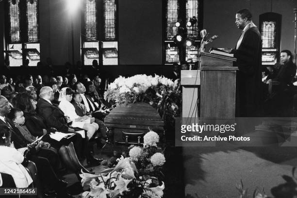 Clergyman and civil rights leader Ralph Abernathy presides over the funeral of assassinated civil rights leader Martin Luther King Jr at the Ebenezer...
