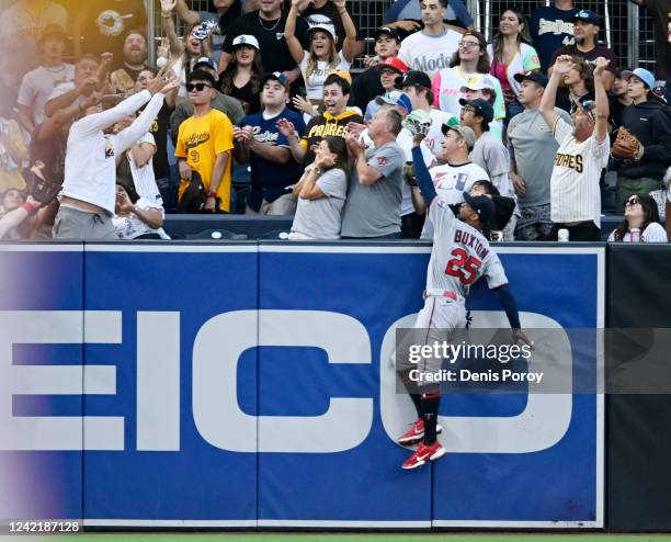 Byron Buxton of the Minnesota Twins fails to make the catch on a two-run home run hit by Luke Voit of the San Diego Padres during the first inning of...