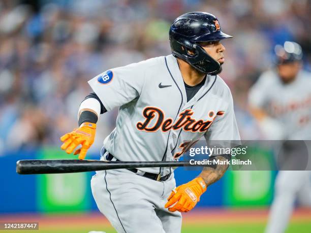 Harold Castro of the Detroit Tigers hits a two RBI single against the Toronto Blue Jays in the fifth inning during their MLB game at the Rogers...