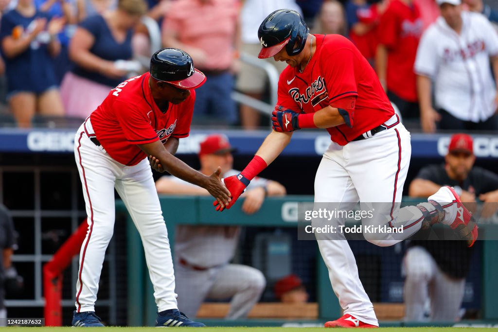 Austin Riley Third Base Austin Riley reacts with \third base coach, Ron Washington of the ...