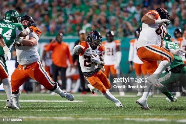 James Butler of the BC Lions finds a hole to run through in the game between the BC Lions and Saskatchewan Roughriders at Mosaic Stadium on July 29,...