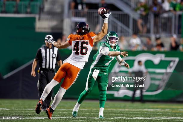 Ben Hladik of the BC Lions knocks down a pass attempt from Cody Fajardo of the Saskatchewan Roughriders in the game between the BC Lions and...