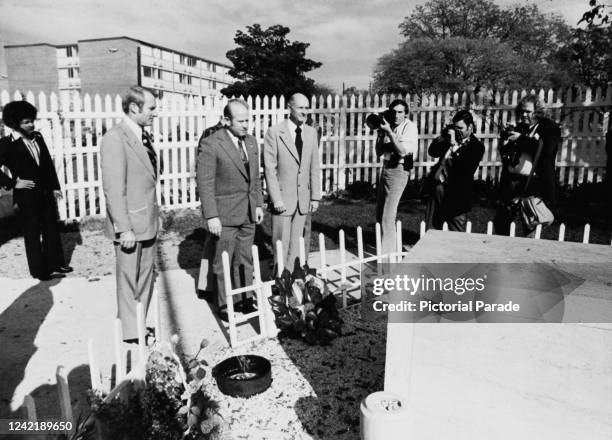 The crew of the Apollo-Soyuz Test Project , a joint US-Soviet space mission, lay a wreath at the grave of assassinated civil rights leader Dr Martin...