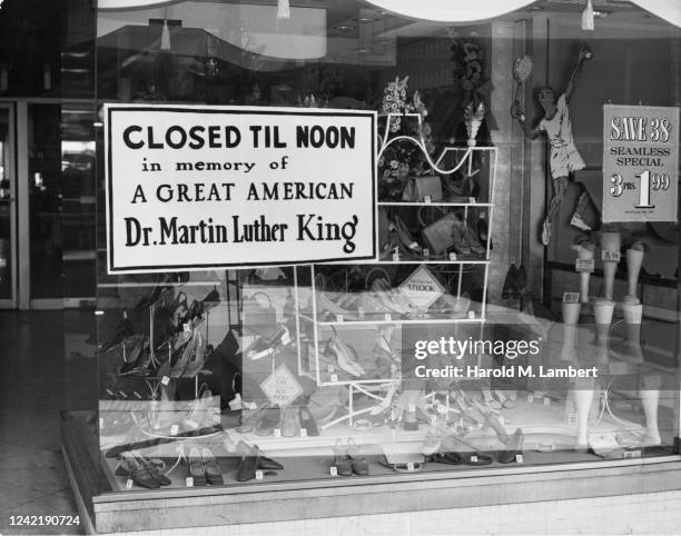Shoe store is closed till noon in memory of 'A Great American', recently assassinated civil rights leader Dr Martin Luther King Jr, USA, April 1968.