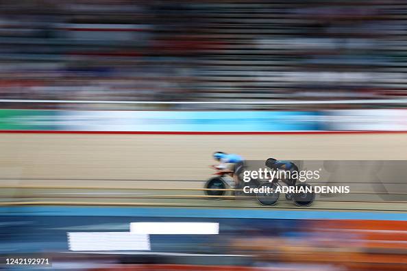 Picrell Canada's Riley Pickrell and India's Dinesh Kumar compete in the men's ...