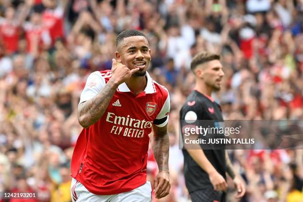 Arsenal's Brazilian forward Gabriel Jesus celebrates after scoring his team second goal during a club friendly football match between Arsenal and...