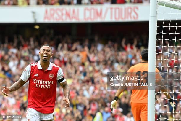 Arsenal's Brazilian forward Gabriel Jesus celebrates after scoring his team third goal during a club friendly football match between Arsenal and...