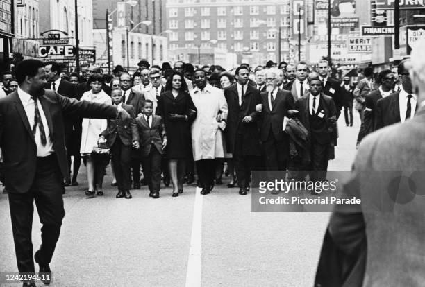 Coretta Scott King leads thousands of protestors through Memphis, Tennessee, in support of the city's striking sanitation workers, 8th April 1968....