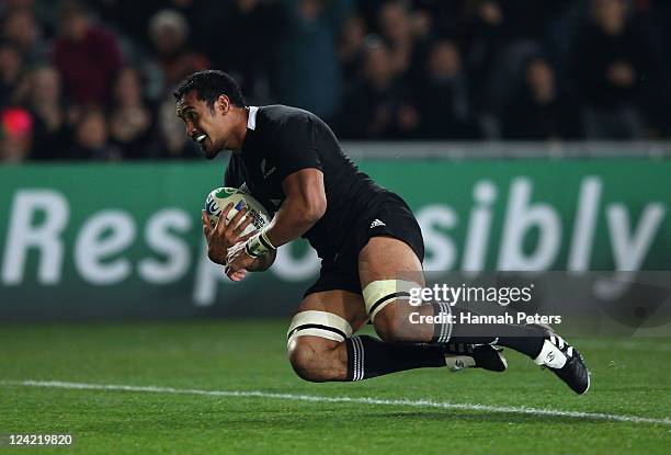 Jerome Kaino of the All Blacks goes over to score a try during the IRB 2011 Rugby World Cup Pool A match between New Zealand and Tonga at Eden Park...