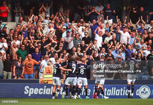 Millwall fans celebrates after Charlie Cresswell scores their first goal during the Sky Bet Championship match at the The Den, London. Picture date:...
