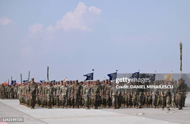 Military personnel of the US Army's 101st Airborne Division march during a demonstration drill at Mihail Kogalniceanu Airbase near Constanta, Romania...