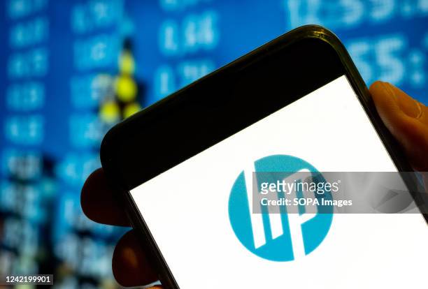 In this photo illustration, the American multinational information technology company Hewlett-Packard logo is displayed on a smartphone screen.
