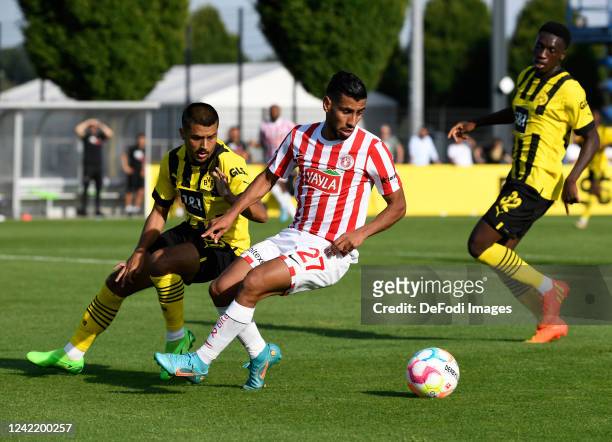 Lion Semic of Borussia Dortmund and Houssam Ghacha of Antalyaspor battle for the ball during the pre-season friendly match between Borussia Dortmund...