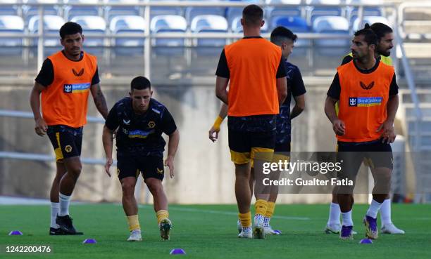 Daniel Podence of Wolverhampton Wanderers FC with teammates in action during the warm up before the start of the Pre-Season Friendly match between...