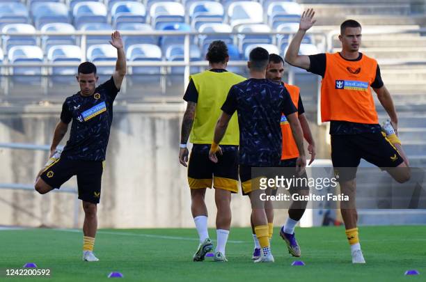 Daniel Podence of Wolverhampton Wanderers FC with teammates in action during the warm up before the start of the Pre-Season Friendly match between...