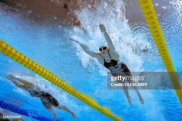 South Africa's Lara van Niekerk competes against Australia's Chelsea Hodges to win and take the gold medal in the women's 50m breaststroke swimming...