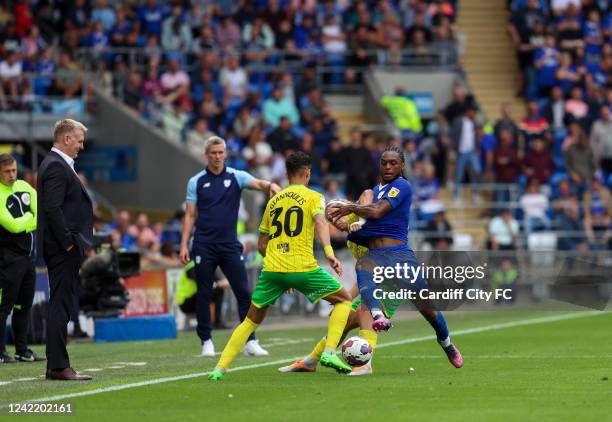 Andy Rinomhota of Cardiff City FC and Dimitris Giannoulis of Norwich City during the Sky Bet Championship between Cardiff City and Norwich City at...