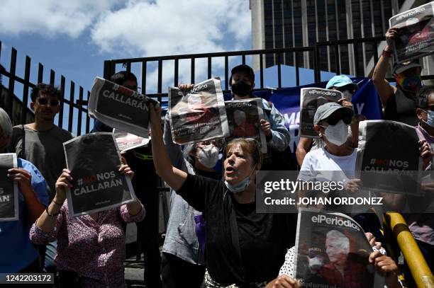 Guatemalan journalists protest against the arrest of Jose Ruben Zamora, president of the newspaper El Periodico, outside the Justice Palace in...