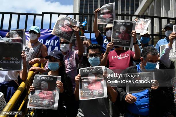 Guatemalan journalists protest against the arrest of Jose Ruben Zamora, president of the newspaper El Periodico, outside the Justice Palace in...