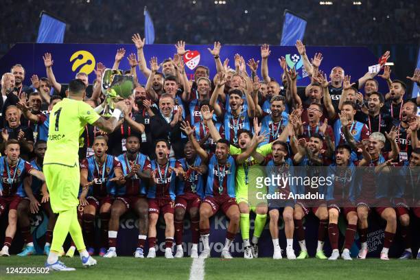 Ugurcan Cakir, players and technical committee of Besiktas celebrate at the end of the Turkcell Super Cup match between Trabzonspor and Demir Grup...