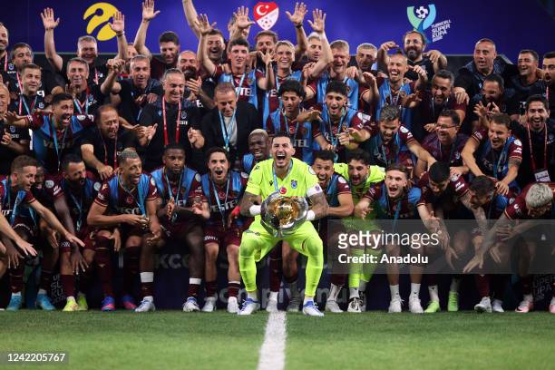 Ugurcan Cakir, players and technical committee of Besiktas celebrate at the end of the Turkcell Super Cup match between Trabzonspor and Demir Grup...