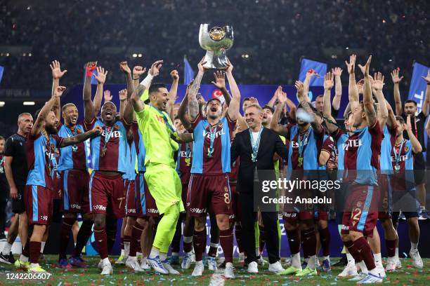 Ugurcan Cakir, players and technical committee of Besiktas celebrate at the end of the Turkcell Super Cup match between Trabzonspor and Demir Grup...