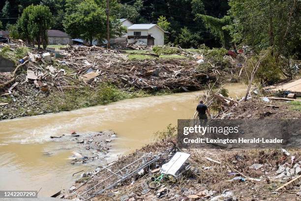 Search and Rescue units in Kentucky look around Troublesome Creek for multiple people still missing after flooding swept through the area, on...