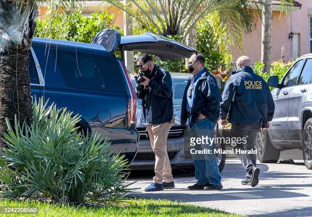 Authorities take pictures of former state Senator Frank Artiles&apos; car as they raid his home in Palmetto Bay, Florida, on March 17, 2021.