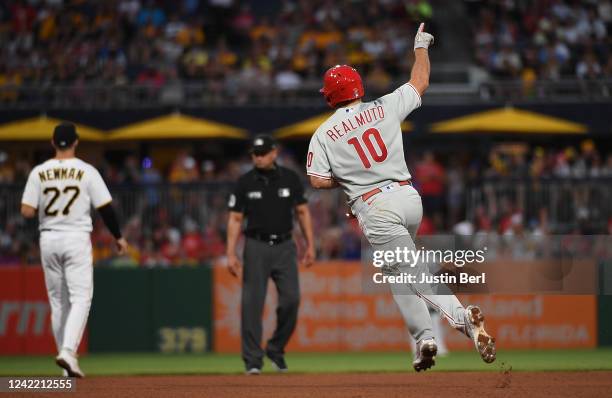 Realmuto of the Philadelphia Phillies reacts as he rounds the bases after hitting a solo home run in the sixth inning during the game against the...