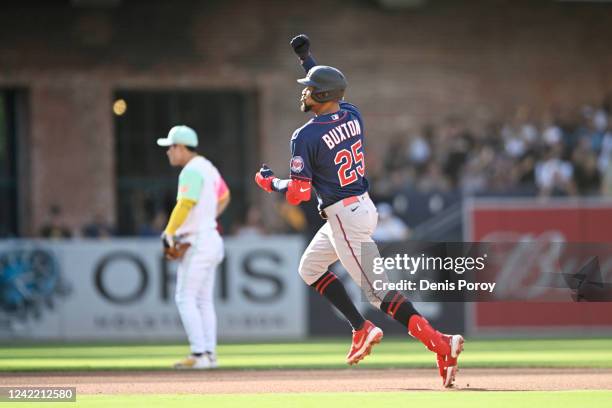 Byron Buxton of the Minnesota Twins rounds the bases after hitting a solo home run during the fourth inning of a baseball game against the San Diego...