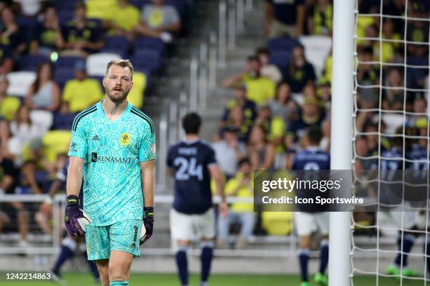 Nashville SC goalkeeper Joe Willis looks off in disgust after allowing a late goal during a match between Nashville SC and the Vancouver Whitecaps,...