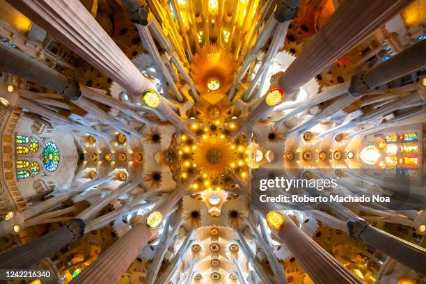 Interior stained glass and architecture in La Sagrada Familia which is a Unesco World Heritage Site.