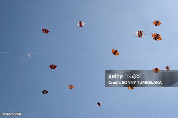 Kites are seen during the Kite Festival at Mertasari beach in Sanur on the Indonesian resort island of Bali on July 31, 2022.