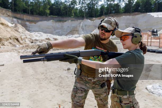 Ukrainian civilians take part in weapons training to learn military skills at a shooting range in Lviv amid the Russian invasion. Russia invaded...