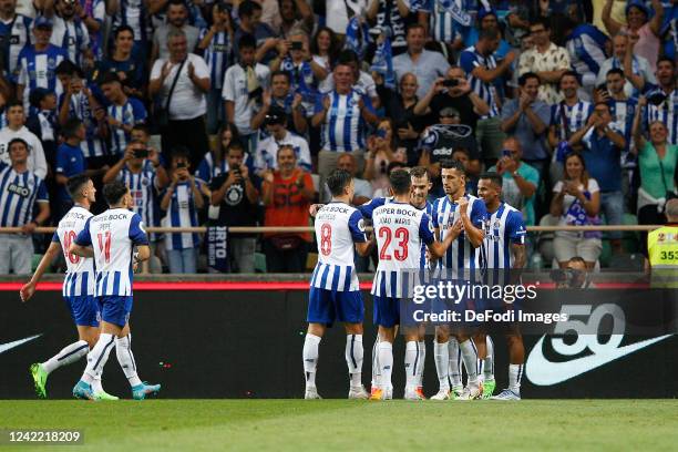 Mehdi Taremi of FC Porto celebrates after scoring his team's third goal with teammates during the Supertaca Candido de Oliveira Final match between...