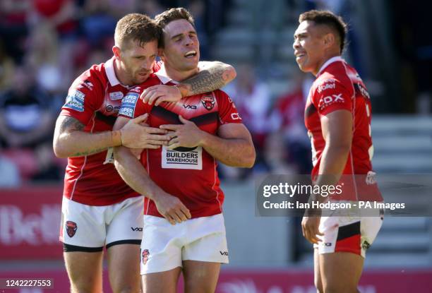 Salford Red Devils' Brodie Croft celebrates a try against St Helens during the Betfred Super League match at the AJ Bell Stadium, Salford. Picture...