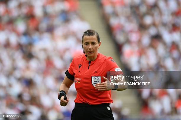 Ukrainian referee Kateryna Monzul reacts during the UEFA Women's Euro 2022 final football match between England and Germany at the Wembley stadium,...