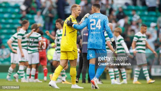 Joe Hart of Celtic and Kelle Roos of Aberdeen after the end of the Cinch Scottish Premiership match between Celtic FC and Aberdeen FC at Celtic Park...