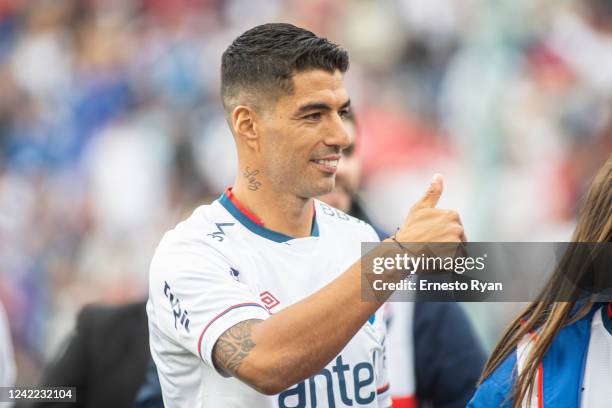 Uruguayan football player Luis Suarez looks on during his unveiling as the new player of Nacional at the Parque Central Stadium on July 31, 2022 in...