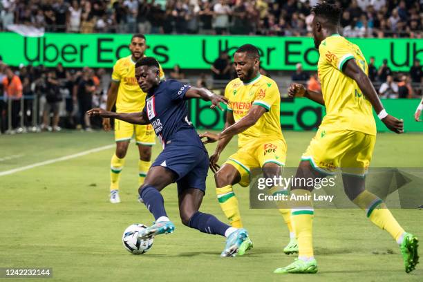 Paris Saint-Germain's tavares Mendes in action with Fc Nantes' simon Moses during the Champions Trophy at Bloomfield Stadium on July 31, 2022 in Tel...